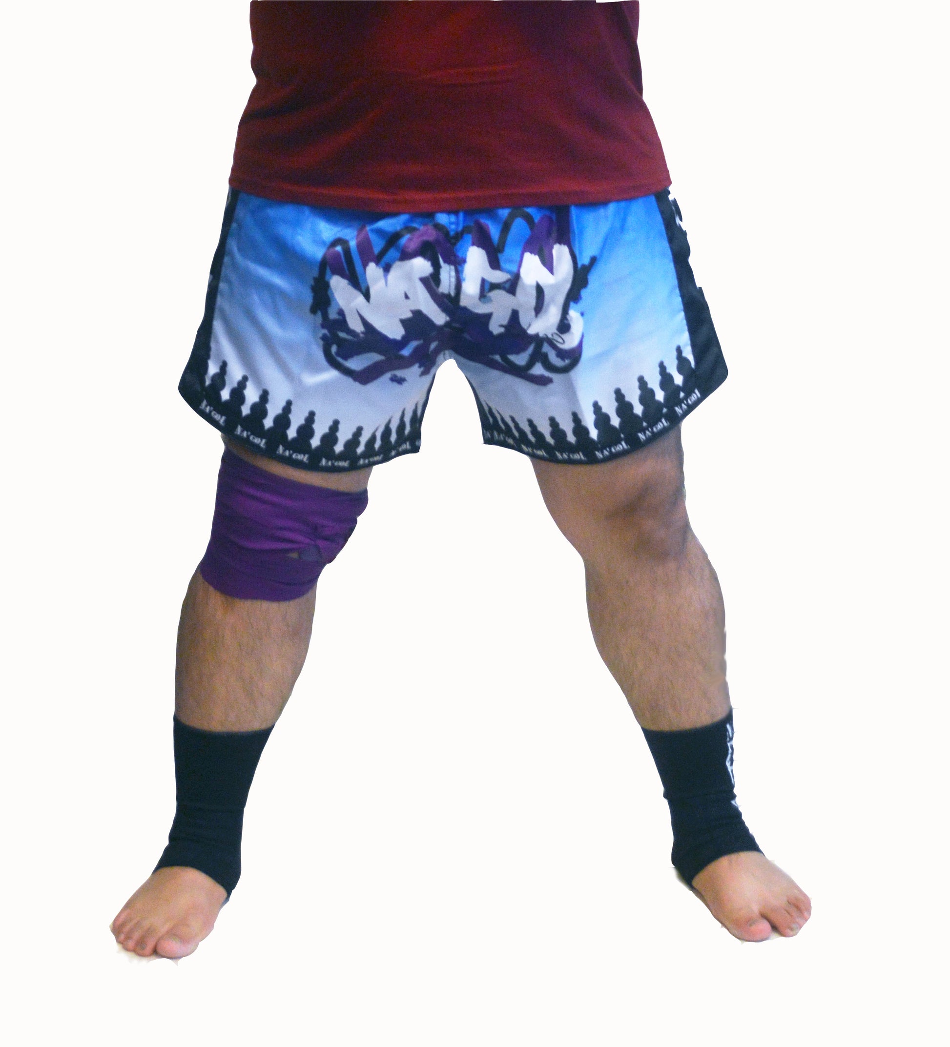 Person wearing blue and white shorts with a visible brand logo on a white background