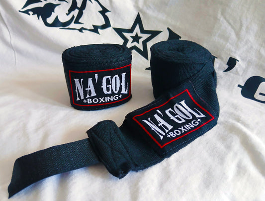 Black boxing hand wraps with 'NA'GOL BOXING' branding on a white background.