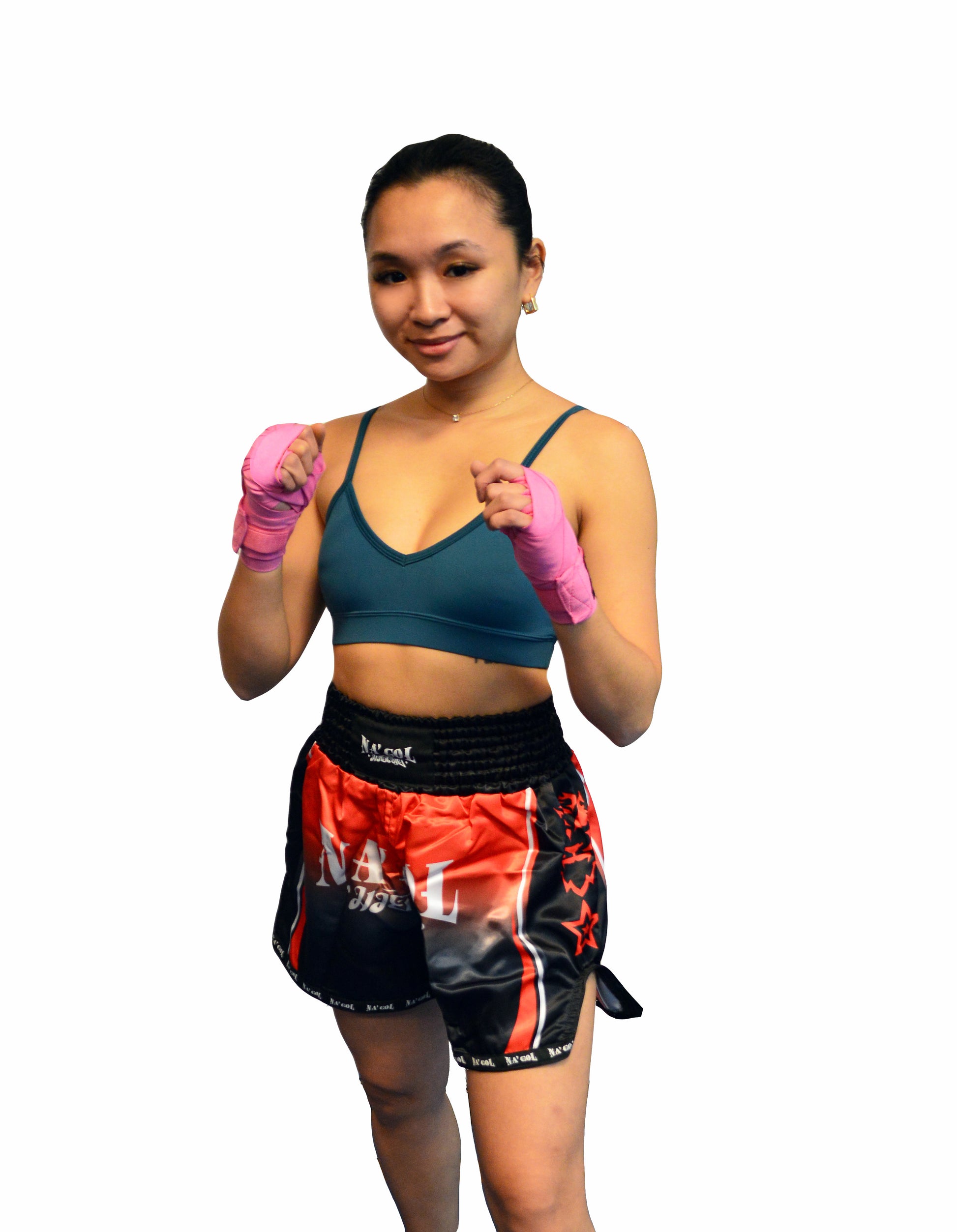 Person wearing boxing hand wraps and shorts on a white background