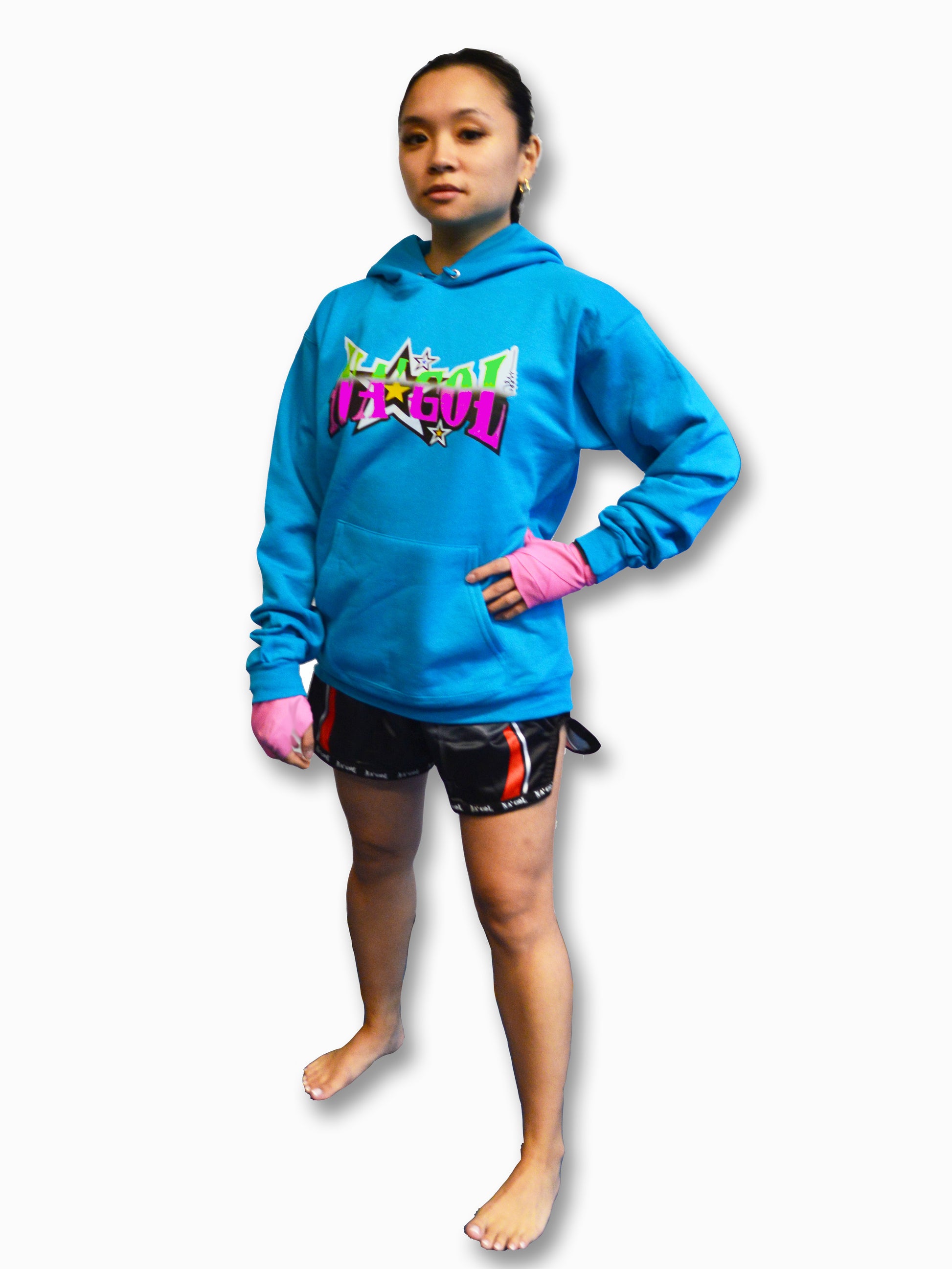 Person wearing a blue hoodie with colorful graphics and black shorts on a white background